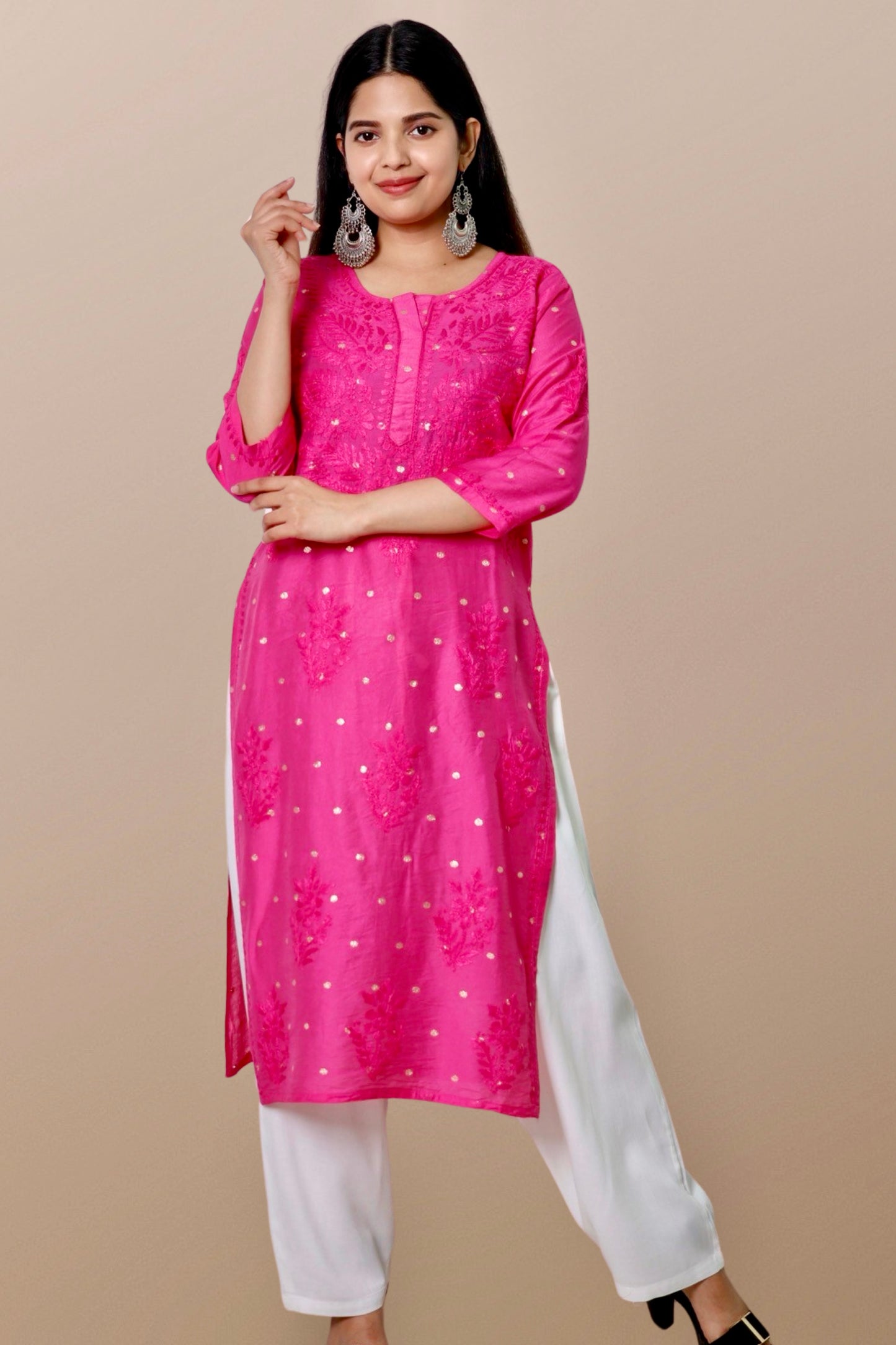 "Chikankari Kurta: A hand-embroidered Chanderi kurta featuring intricate Chikankari craftsmanship, showcasing delicate floral and geometric patterns for a timeless and elegant look."