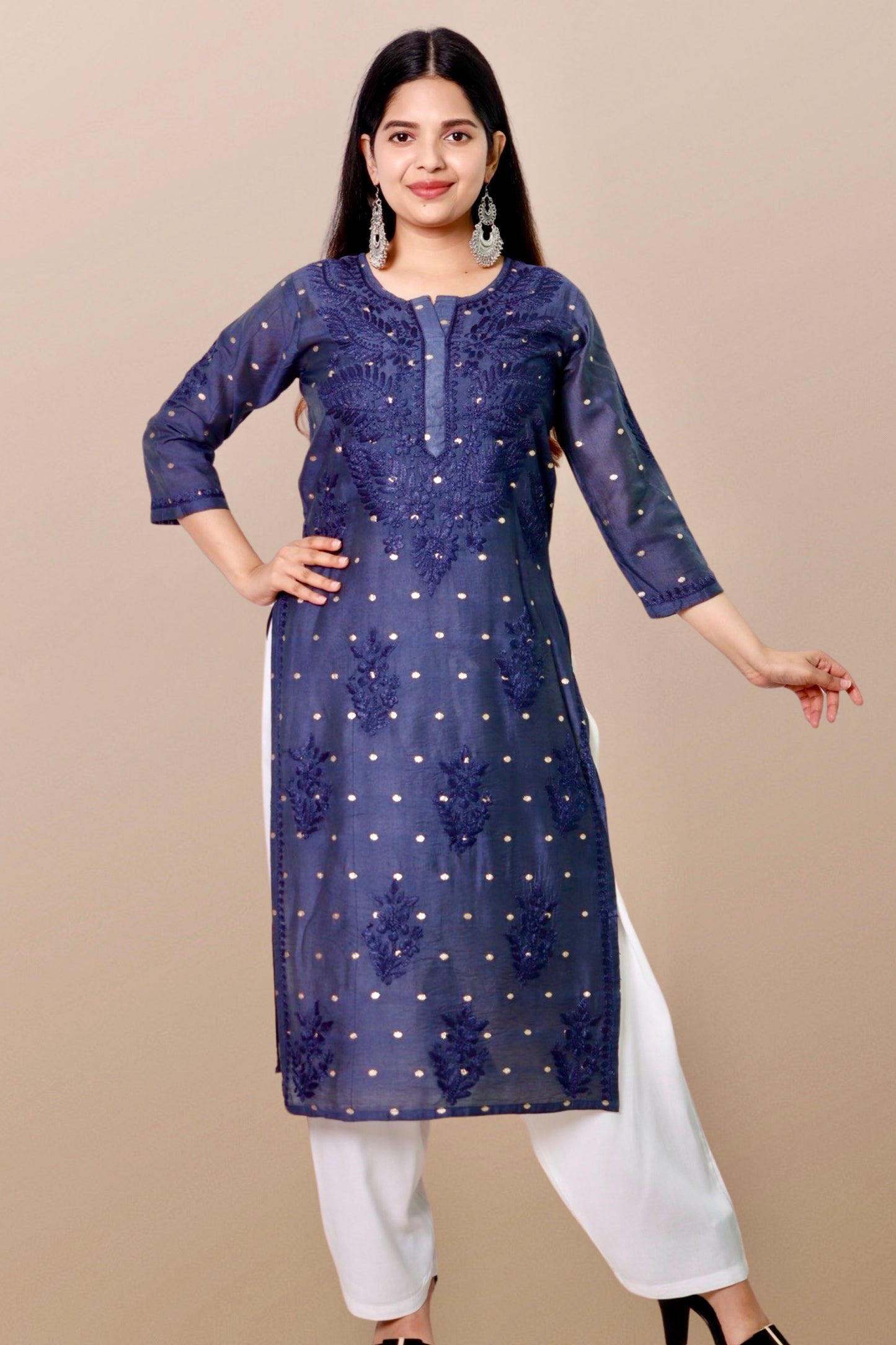 "Chikankari Kurta: A hand-embroidered Chanderi kurta featuring intricate Chikankari craftsmanship, showcasing delicate floral and geometric patterns for a timeless and elegant look."