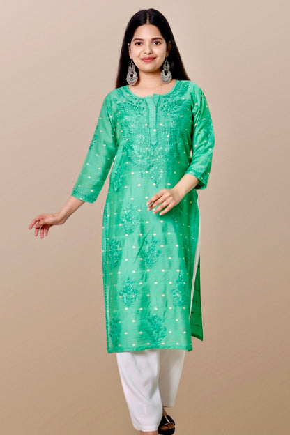 "Chikankari Kurta: A hand-embroidered Chanderi kurta featuring intricate Chikankari craftsmanship, showcasing delicate floral and geometric patterns for a timeless and elegant look."