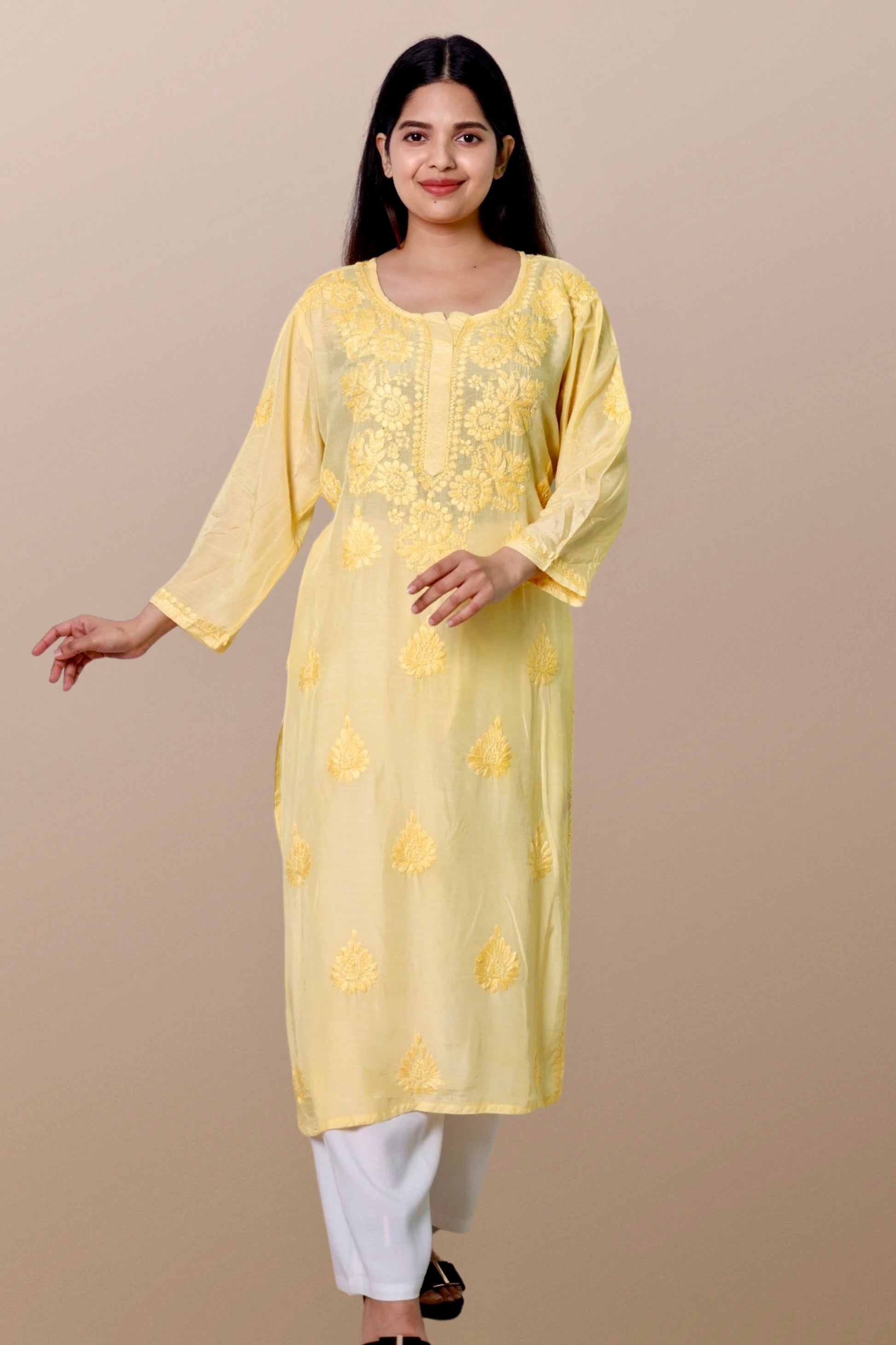 "Chikankari Kurta: A hand-embroidered Chanderi kurta featuring intricate Chikankari craftsmanship, showcasing delicate floral and geometric patterns for a timeless and elegant look."