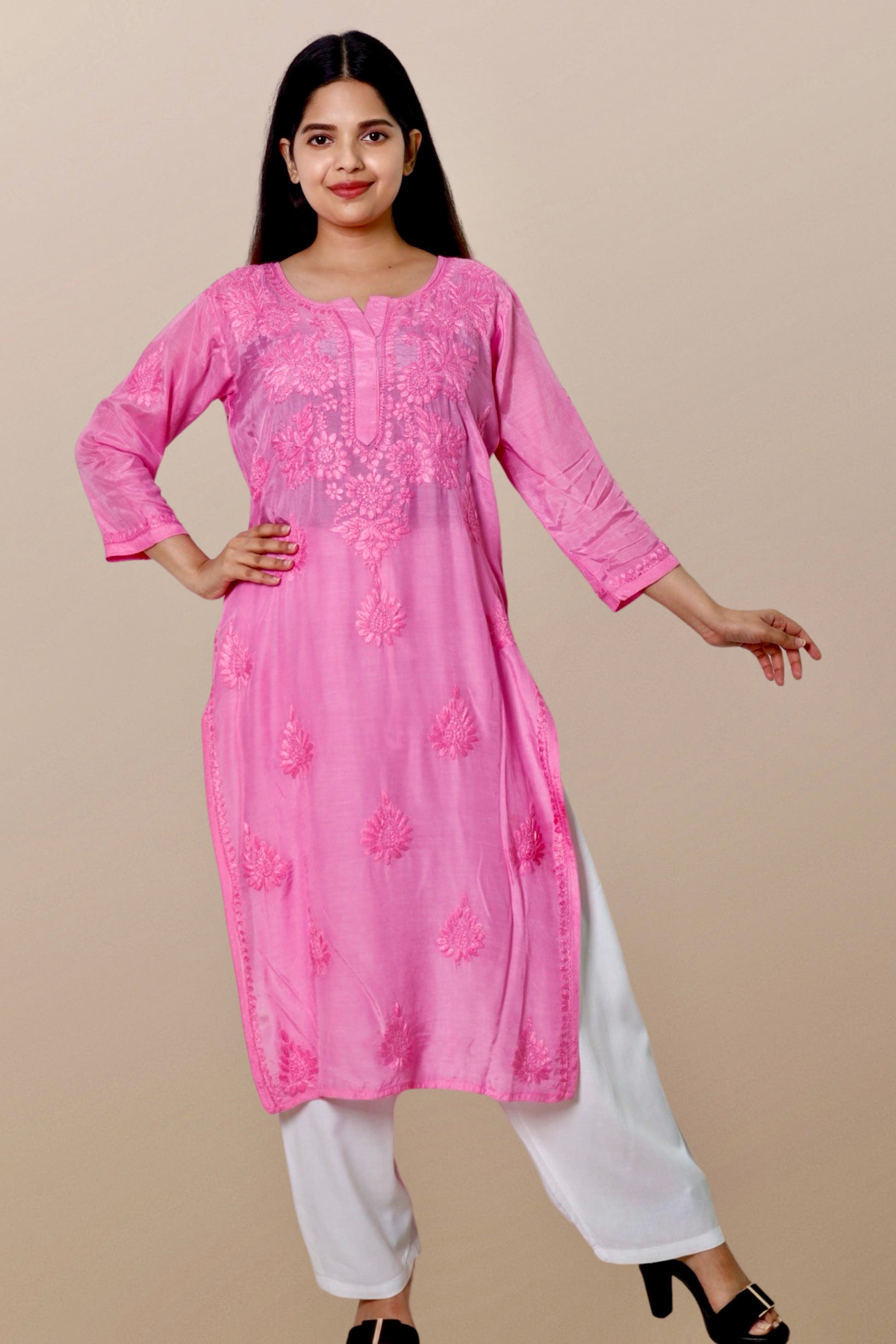 "Chikankari Kurta: A hand-embroidered Chanderi kurta featuring intricate Chikankari craftsmanship, showcasing delicate floral and geometric patterns for a timeless and elegant look."