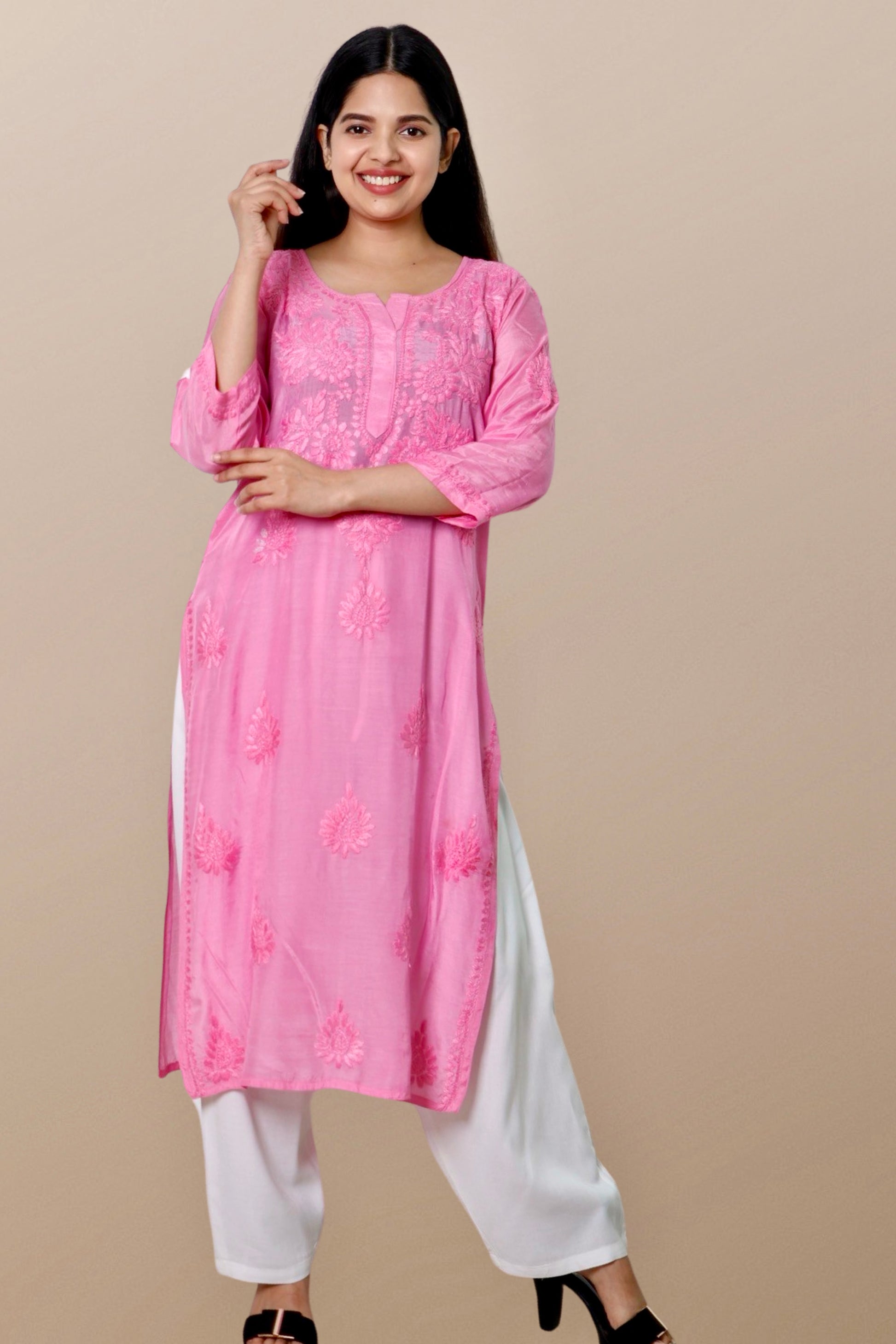 "Chikankari Kurta: A hand-embroidered Chanderi kurta featuring intricate Chikankari craftsmanship, showcasing delicate floral and geometric patterns for a timeless and elegant look."