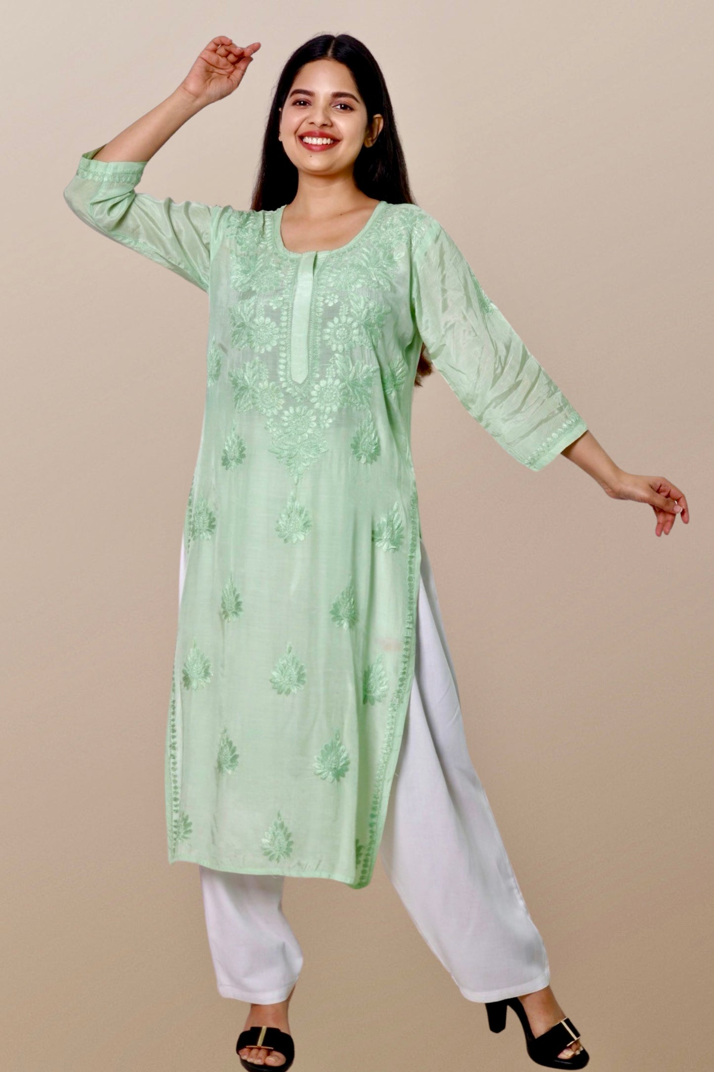 "Chikankari Kurta: A hand-embroidered Chanderi kurta featuring intricate Chikankari craftsmanship, showcasing delicate floral and geometric patterns for a timeless and elegant look."