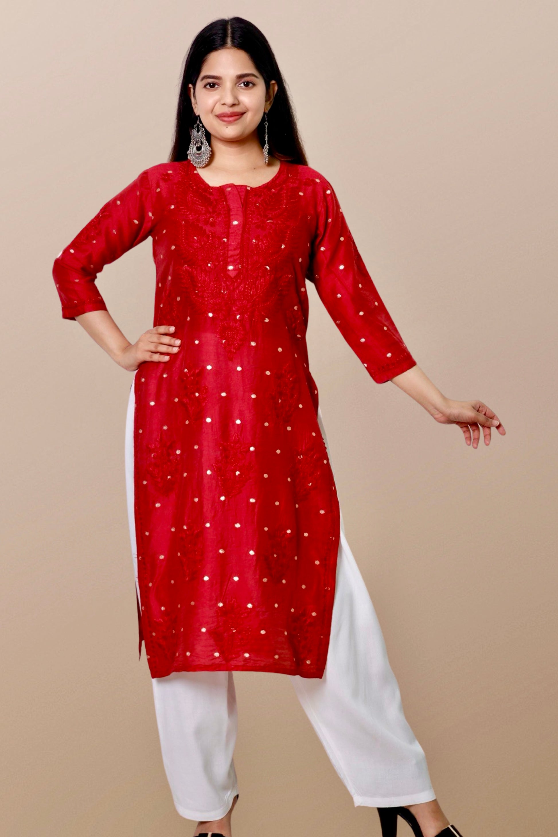 "Chikankari Kurta: A hand-embroidered Chanderi kurta featuring intricate Chikankari craftsmanship, showcasing delicate floral and geometric patterns for a timeless and elegant look."