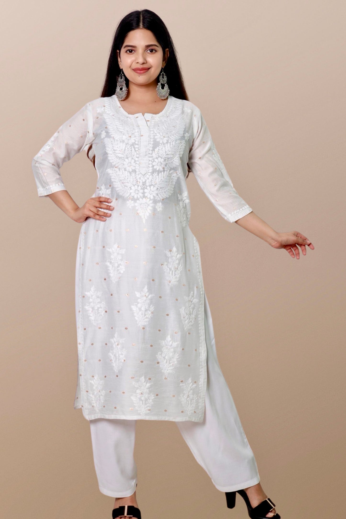 "Chikankari Kurta: A hand-embroidered Chanderi kurta featuring intricate Chikankari craftsmanship, showcasing delicate floral and geometric patterns for a timeless and elegant look."